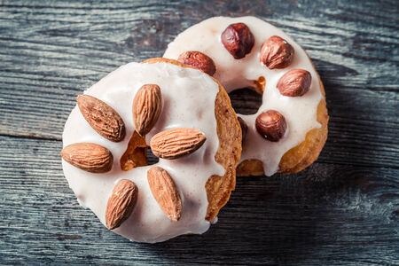 Donuts with almond and hazelnutの写真素材