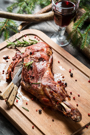 Freshly roasted venison with rosemary and pepperの写真素材