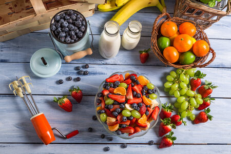 Preparing a healthy fruit saladの写真素材