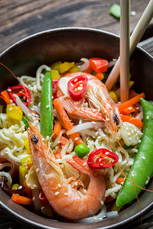 Shrimp with vegetables and noodlesの写真素材