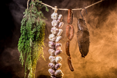 Smoked ham in homemade smokehouseの写真素材