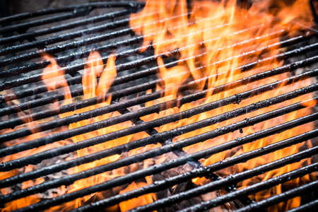 Roasted chicken legs on the old grill