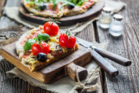 Close-up on freshly baked mini pizzasの写真素材