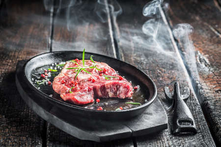 Roasting red meat with rosemaryの写真素材