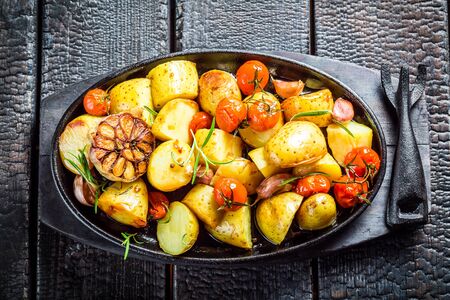 Roasted potato with rosemary and garlicの写真素材