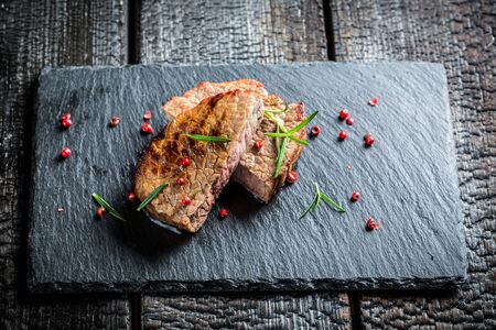 Hot roasted beef with fresh herbsの写真素材