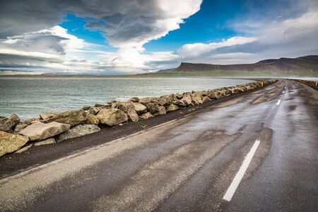 Road over the sea in Icelandの写真素材
