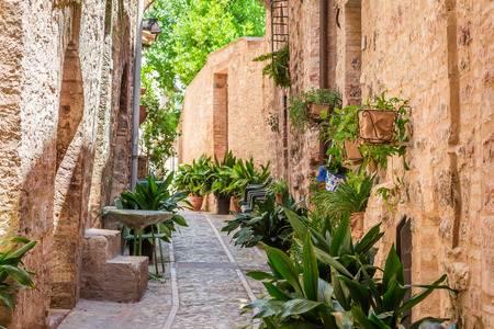 Beautiful decorated porch in small town in Italy in sunny day, Umbriaの写真素材