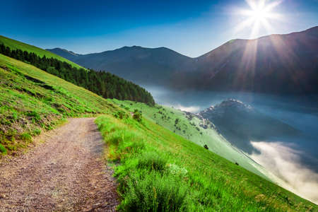 Sunny sunrise in the mountains, Umbria, Italyの写真素材