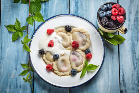 Tasty dumplings with fruitsの写真素材