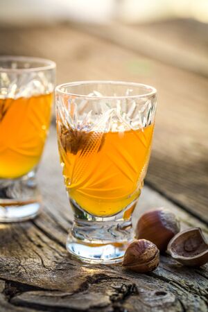 Delicious liqueur with hazelnuts and alcoholの写真素材
