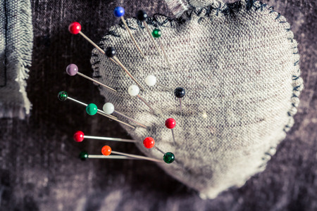 Tailor pins into the materialの写真素材