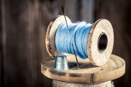 Closeup of vintage needle and threadsの写真素材