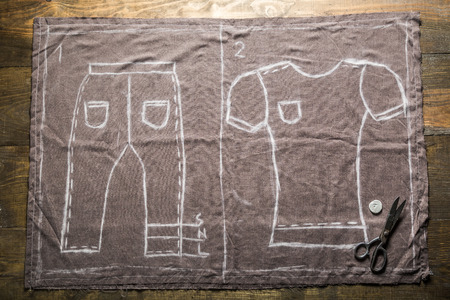 Tailor draft shirts and trousers on the materialの写真素材