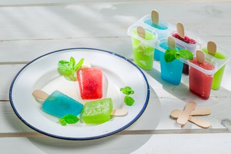 Colorfull ice cream with milk and fruitsの写真素材