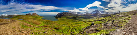 Panorama of valley with the Arctic sea in Iceland
