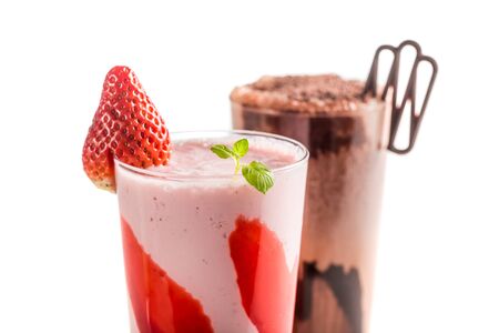 Strawberry and chocolate smoothies on white backgroundの写真素材