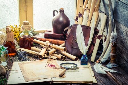 Old witcher labolatory with scrolls and ingredients