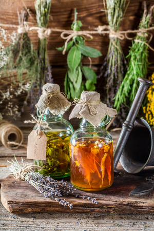 Therapeutic tincture with alcohol and fresh herbsの写真素材