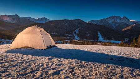 Tent on top in winter in Zakopane, Tatra Mountains, Polandの写真素材