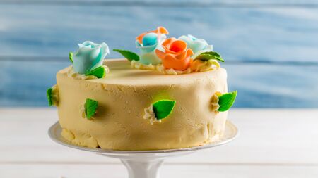 Birthday cake decorated with marzipan rosesの写真素材