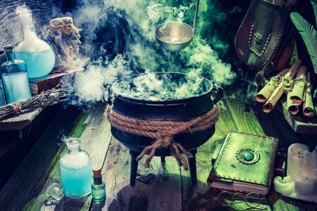 Full of magic mixture witcher hut with blue and green smoke for Halloweenの写真素材