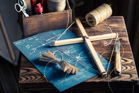 Vintage workshop with kite and elements to construct itの写真素材