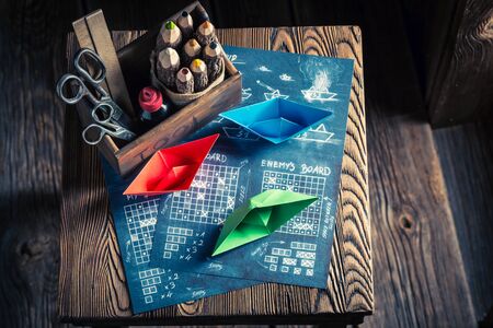 Retro battleship paper game as a strategy game