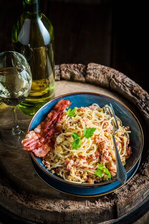 Tasty spaghetti Carborana made of becon, eggs and parsleyの写真素材