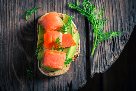 Fresh sandwich with avocado, dill and salmonの写真素材