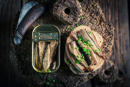 Healthy sandwich wirh sprats with on the wholegrain breadの写真素材