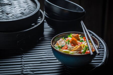 Enjoy your noodle with chicken, vegetables and chili peppersの写真素材