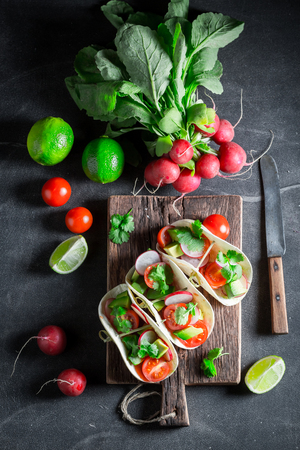 Vegetarian tacos with avocado and fresh corianderの写真素材