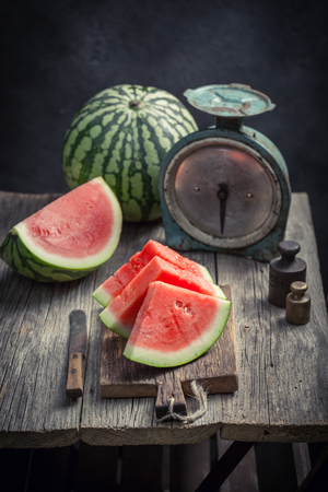 Tasty watermelon in a old rustic kitchenの写真素材