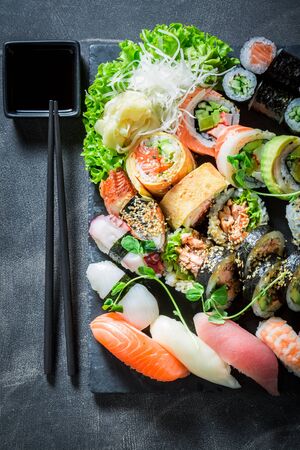 Delicious sushi set made of salmon and avocadoの写真素材