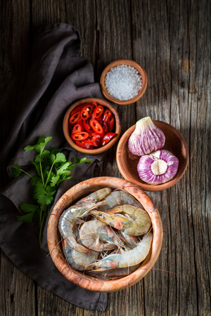 Preparation for homemade and fresh shrimp on wooden bowlの写真素材