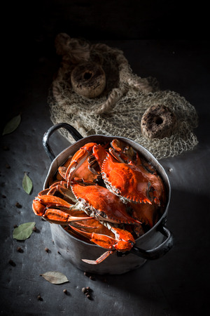 Ingredients for tasty crab with allspice and bay leafの写真素材