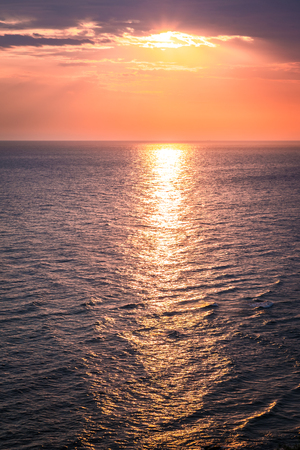 Wonderful dusk over calm ocean in summer, Europeの写真素材