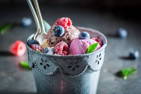 Juicy ice cream with blueberries and raspberries