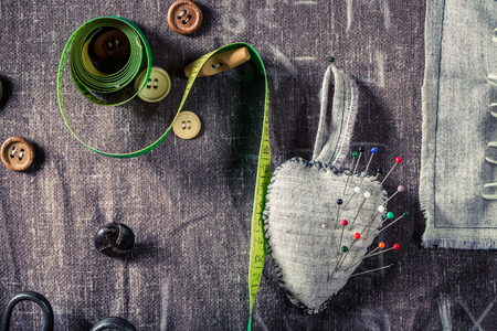Closeup of old scissors and tailor tapeの写真素材