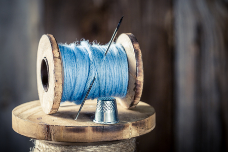 Closeup of blue threads and big needleの写真素材