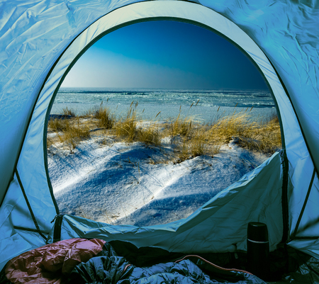 Camping on beach in winter at sea