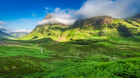Stunning sunrise over Glencoe in Scottish highlandsの写真素材