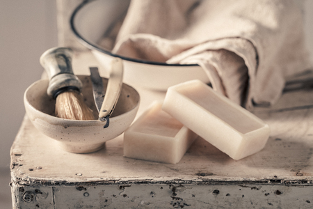 Vintage shaving set with grey soap, razor and brushの写真素材