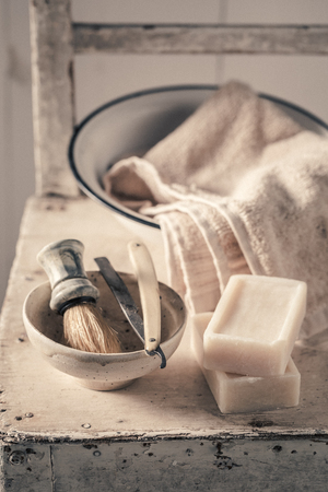 Classic barber equipment with grey soap, razor and brushの写真素材