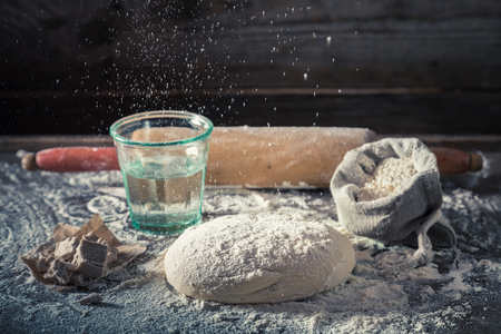Closeup of preparation for baking fresh dough for breadの写真素材