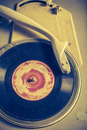 Antique gramophone and old vinyls with scratchedの写真素材