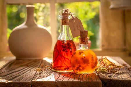 Homemade tincture made of alcohol, honey and lindenの写真素材