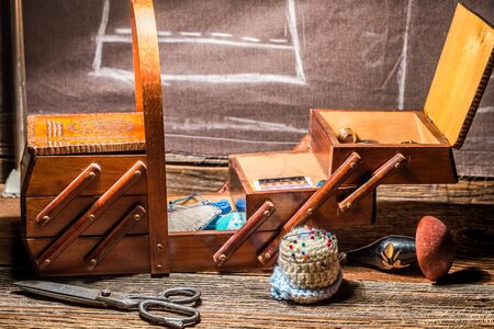 Threads, needles and materials in sewing workshopの写真素材