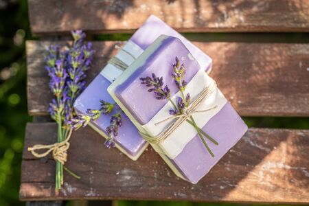 Healthy and natural lavender soap in summer gardenの写真素材